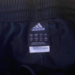 Adidas  black with pink stripe